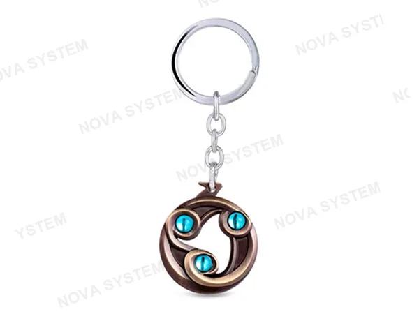 LLAVERO DOTA EVASION BRONZE, COLOR BRONZE, 3 ESFERAS CELESTES INCRUSTADAS, 2 MOD (EVASION BRONZE)